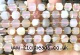 CCU1502 15 inches 8mm - 9mm faceted cube sakura agate beads