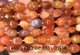 CNG9325 15 inches 10*14mm - 13*18mm nuggets red Botswana agate beads